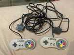 Oryginalne pady Super Nintendo SNES – 2 sztuki, stan bdb