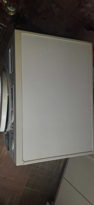 Стиральная машина Атлант 50У86, работает нормально