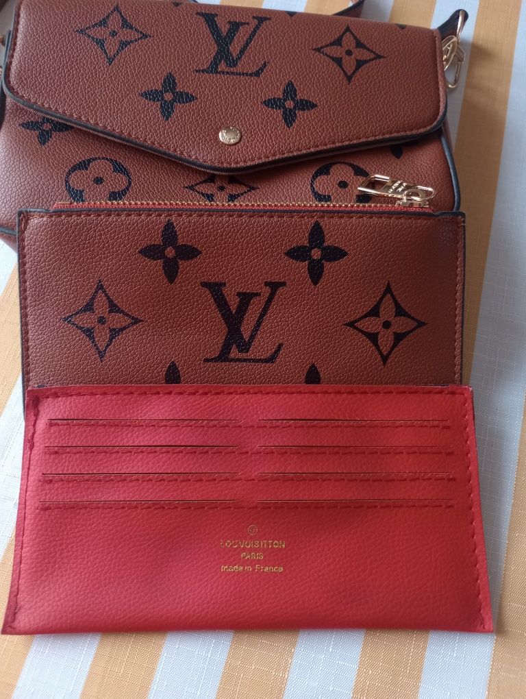 Skórzana kopertówka oryginalna Louis Vuitton