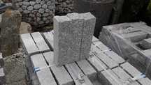 Kostka granitowa Granit cięto-łupany palisada 10x10x40 Krawężni