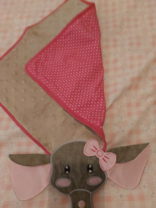 Fralda prende chupeta