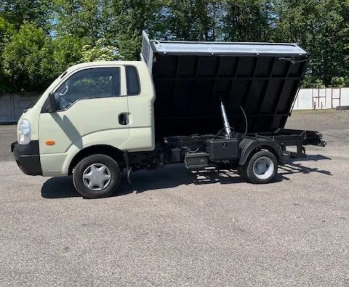 Transport, przewóz ziemi, piasku, gruzu, Castorama, wywrotka