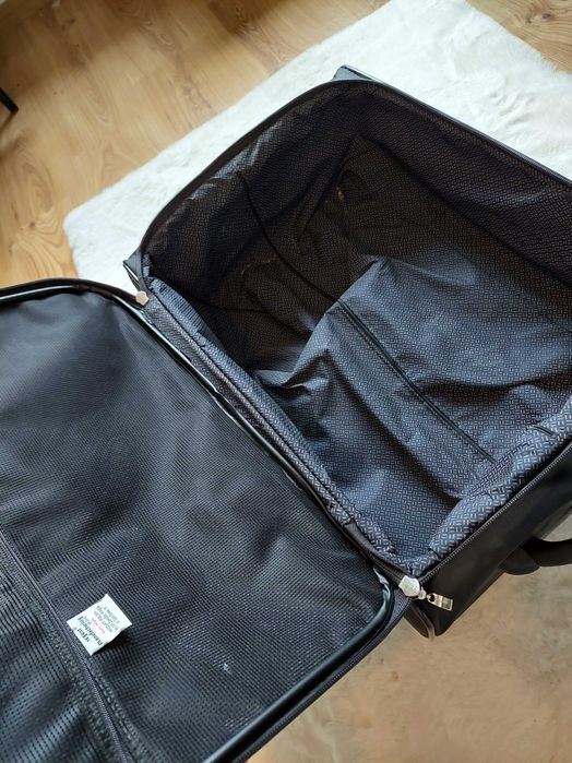 Walizka podróżna na kółkach miękka z kieszeniami średnia  Regent