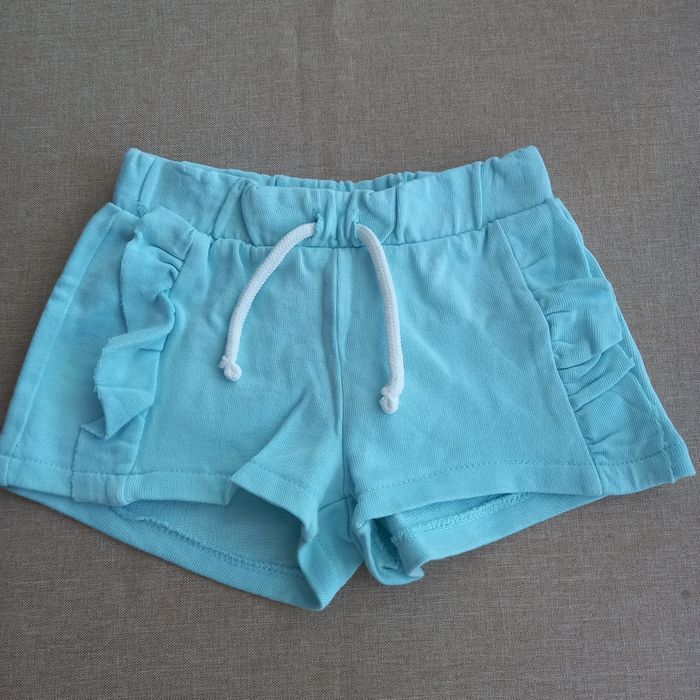 Spodenki dziewczęce bawełniane, Looney Tunes, H&M i in. Rozmiar 98-104