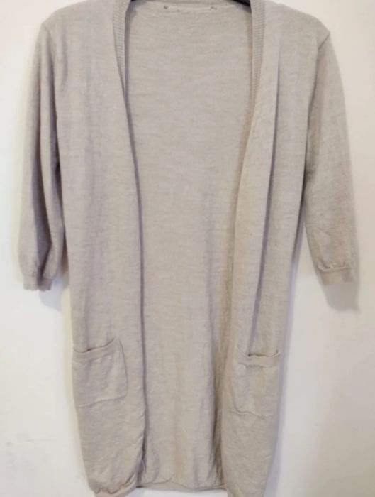 Cardigã de lã merino  
Cardigã ou casaco comprido de lã de excelente q