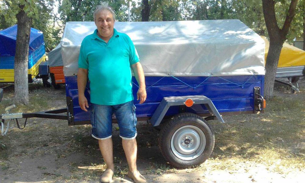 Міцний причіп до автомобіля  від заводу виробника 2000*1300*400