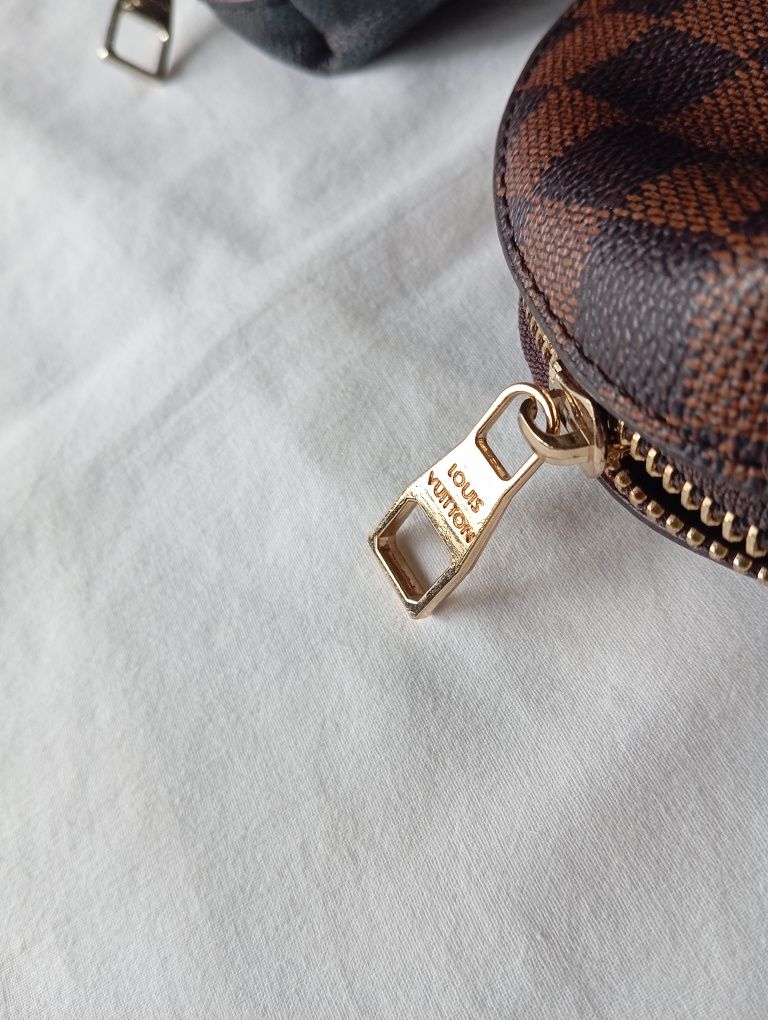 2 Pochetes Louis Vuitton