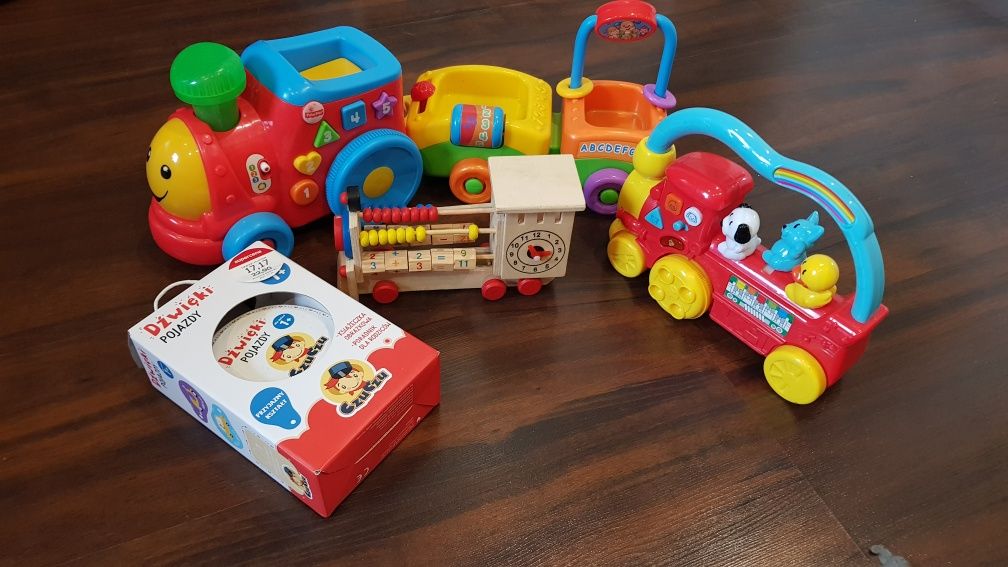 Pociąg fisher price, drewniana lokomotywa, pociąg gra i jeździ,ksiazka