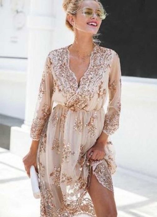 Ошатне плаття в паєтках з вирізом на запах. святкове розмір М(42-44)