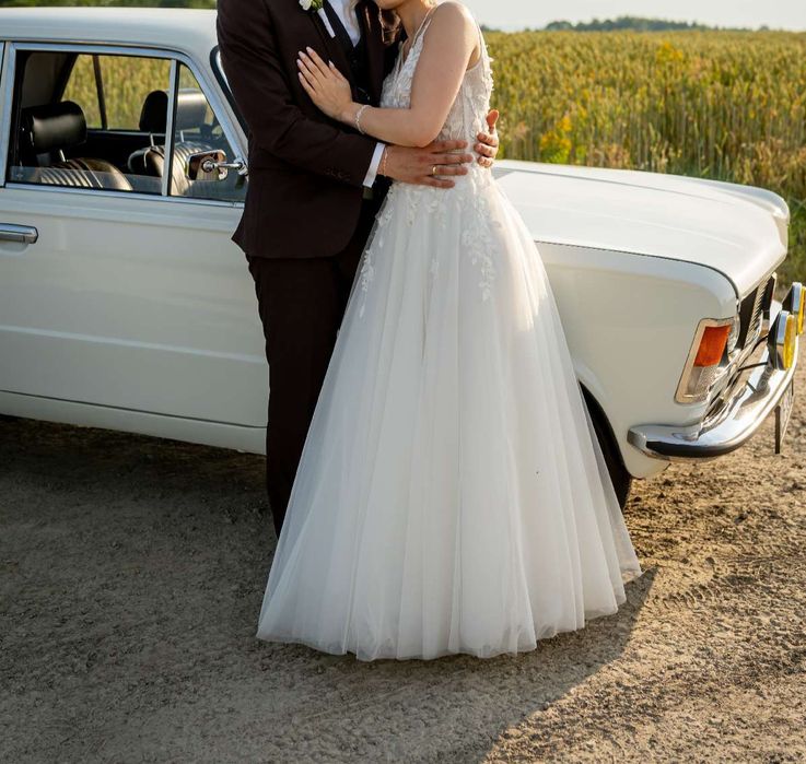 Piękna suknia ślubna, kolekcja 2025