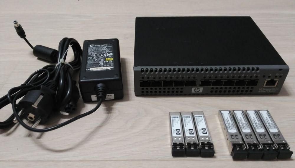 Switch FC HP StorageWorks 4/10q (SANbox 1400) + wkładki FC 4G