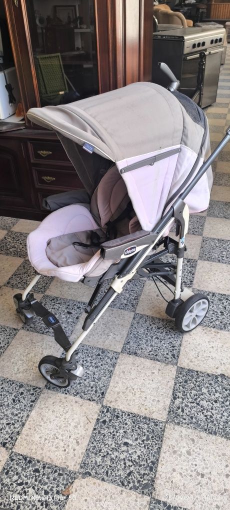 Carrinho de bebé rosa , cinza e bege