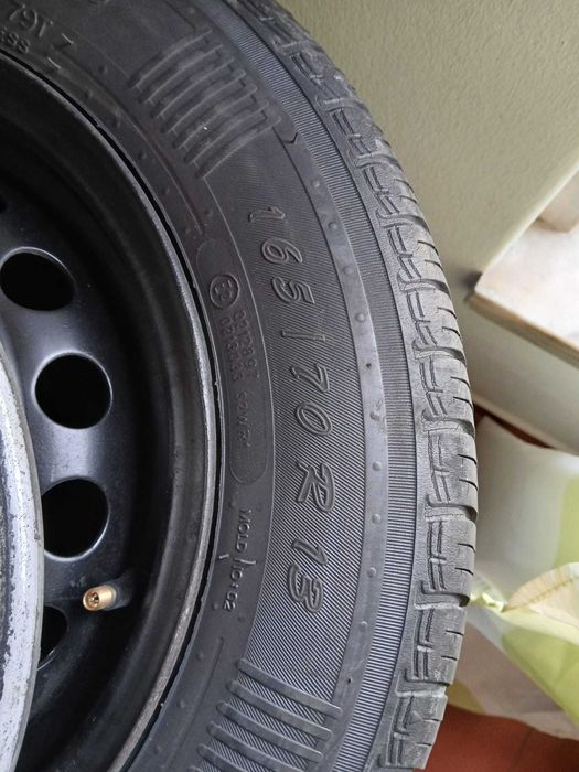 Vendo 4 jantes  4X100 com pneus  usados 50% 165/70/13