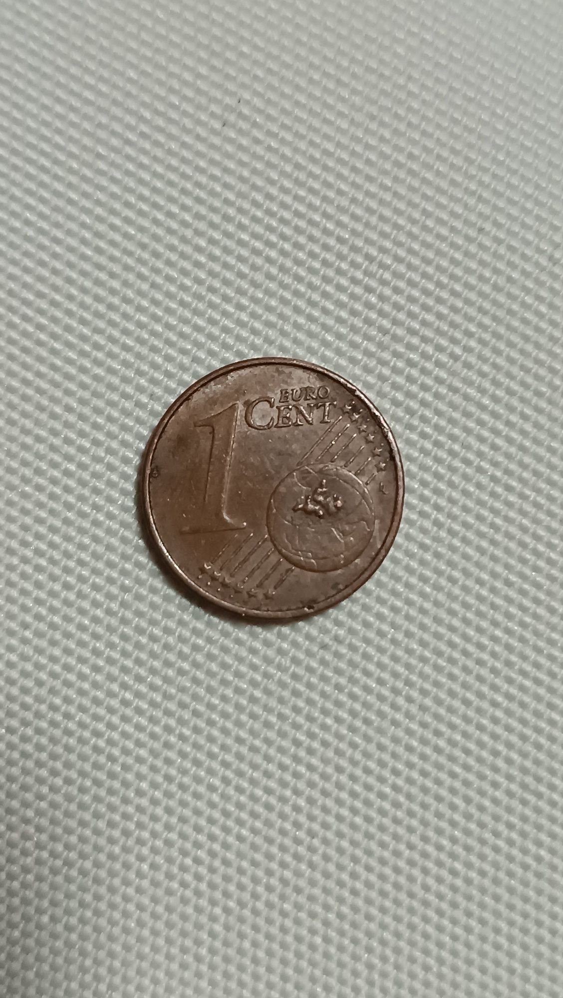 Moeda de 1 cêntimo com defeito em ambos os lados