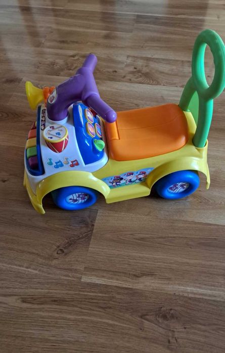 Jeździk, pchacz fisher price muzyczna parada