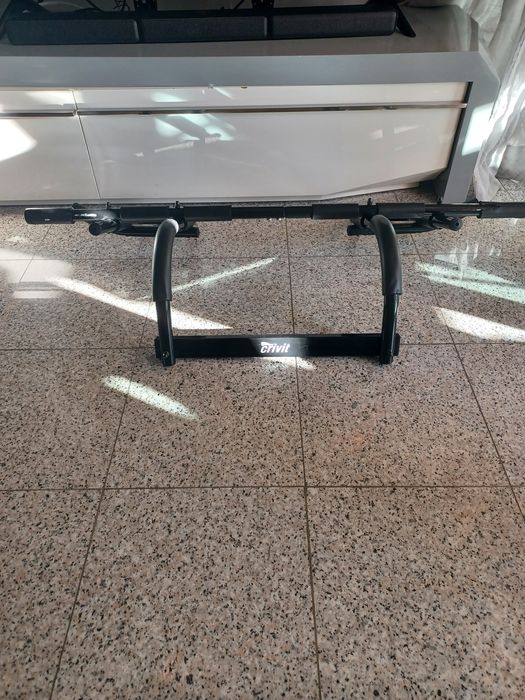 Barra de elevações para porta