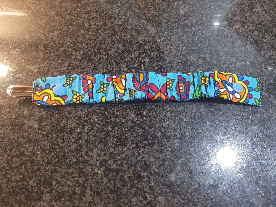 Conjunto babete e porta chucha NOVO.