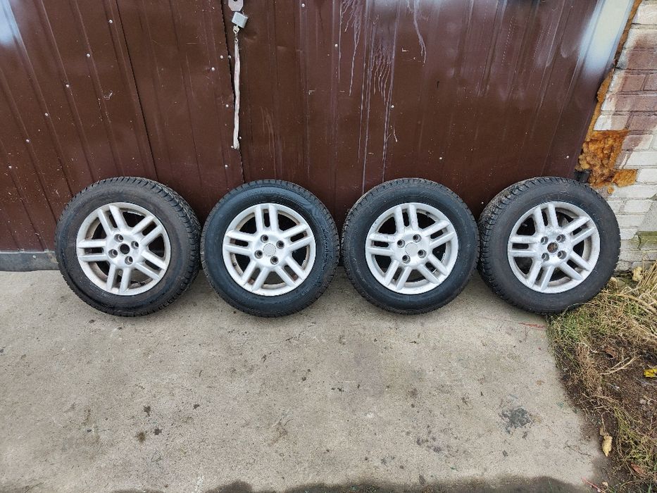 Felgi 14 4x100 et37 opony 185/65/r14 Dębica z opla astry