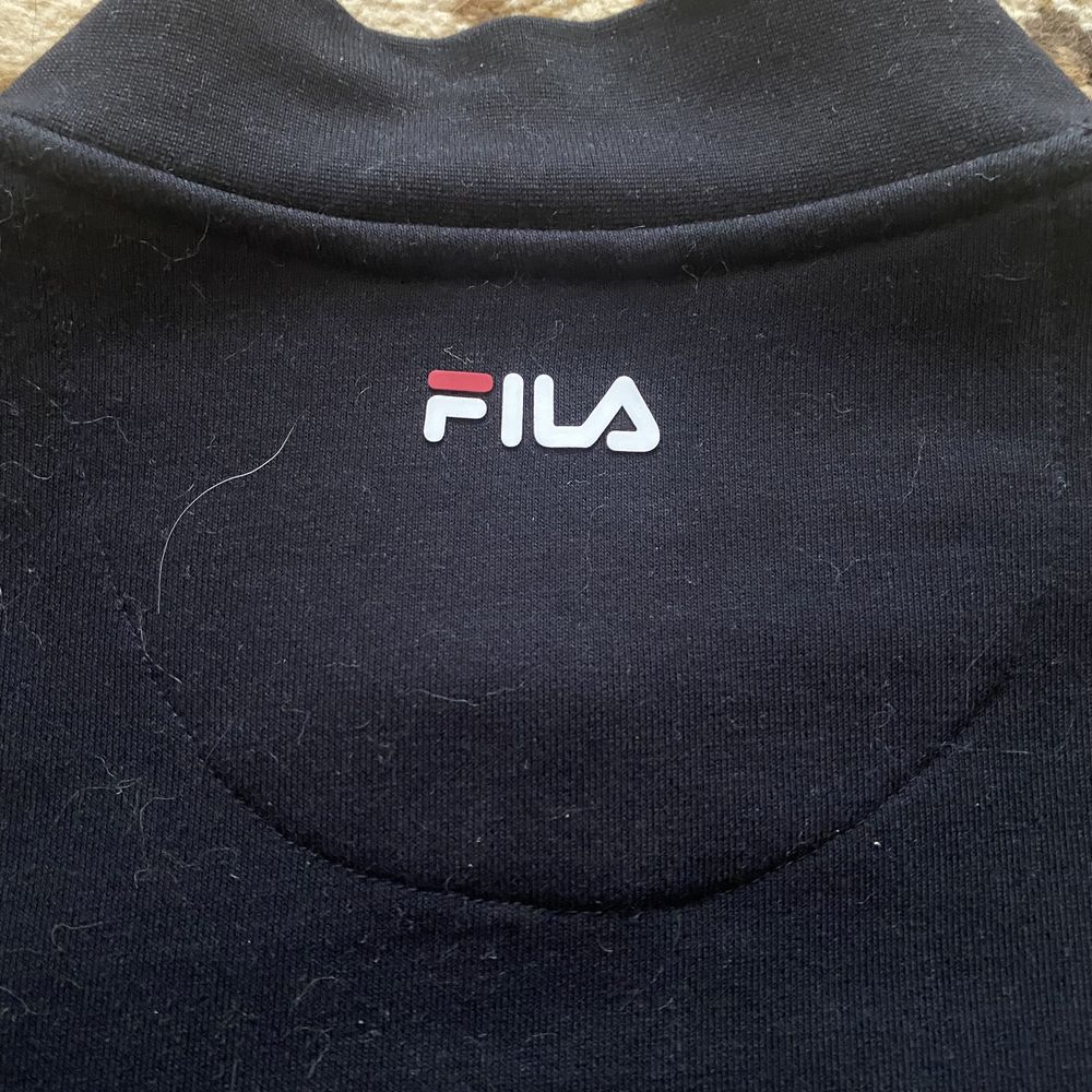 Олімпійка Fila.
