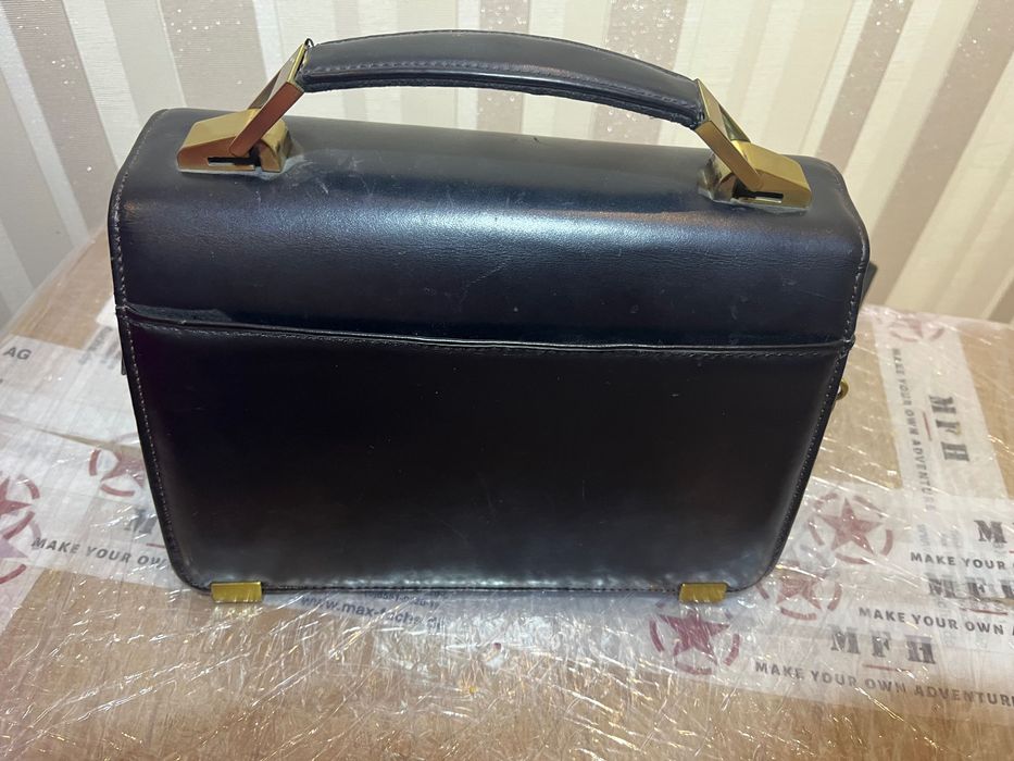 Барсетка чоловіча шкіряна.