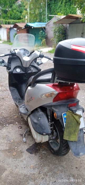 Продам скутер Кумсо гранд дінк 250 куб,водяне охолодження