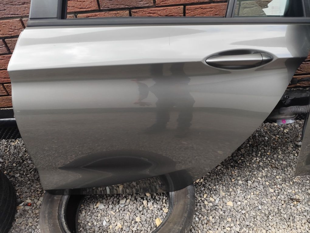 Drzwi lewy przód tył przednie tylne opel astra k kombi z10a