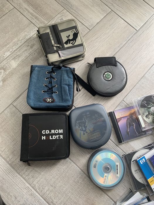 Диски с музыкой, фильмами органайзеры