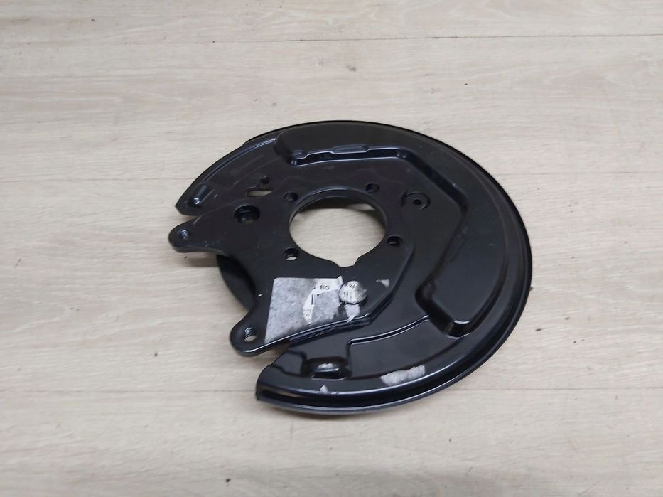 Toyota Celica VII T23 99-06r tarcza kotwiczna tył LEWA osłona tarczy 1,8