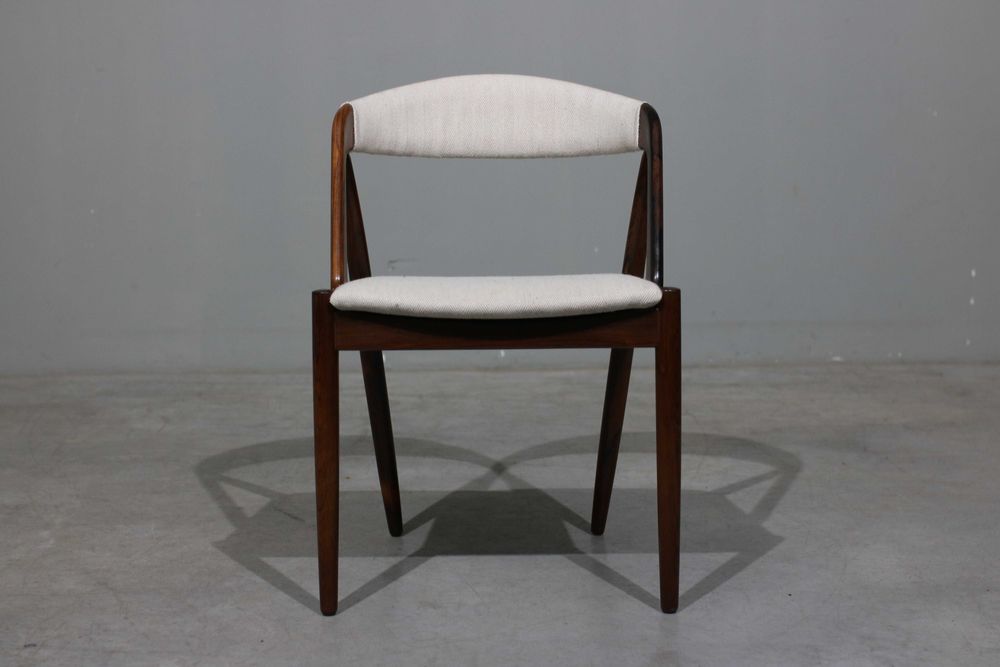 Cadeiras Kai Kristiansen modelo 31 em pau santo | Schou Andersen