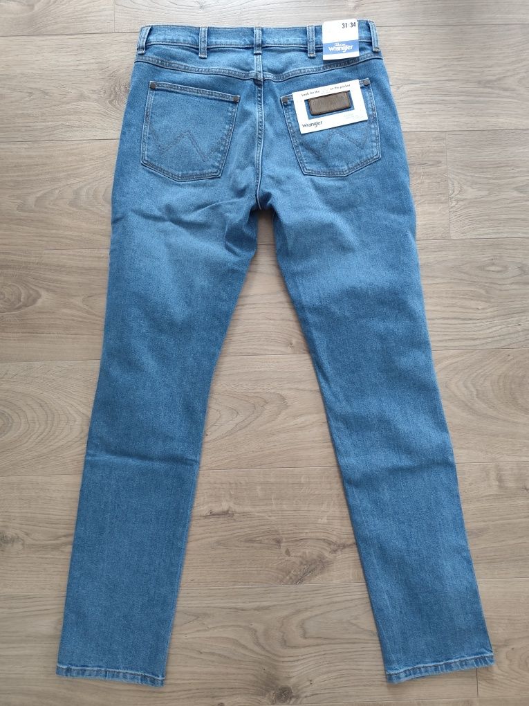 Wrangler Larston 812 slim tapered męskie jeansy dżinsy dziurami 31/34