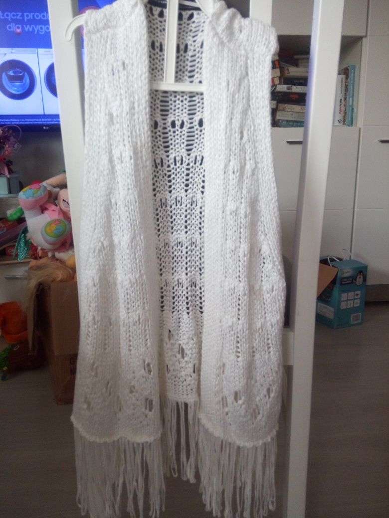 Biała kamizelka 34.