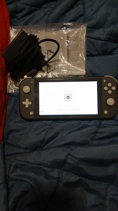 Vendo nintendo Switch Lite com jogos