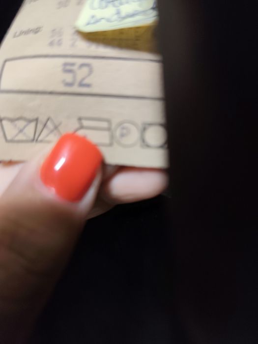 Fato verde escuro quase parece preto