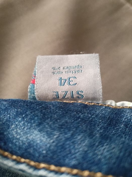 niebieskie jeansy męskie r. 34