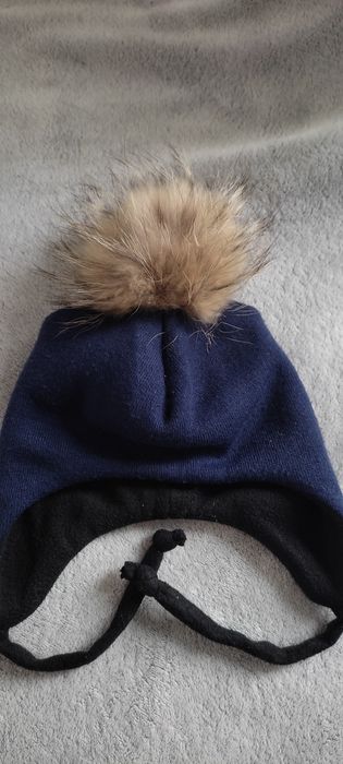 Шапка зимняя с мехом енота