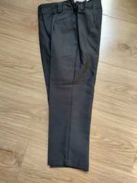Spodnie garniturowe r116