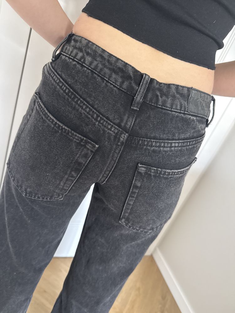 Straight czarne jeansy 32 xxs szerokie z dziurami