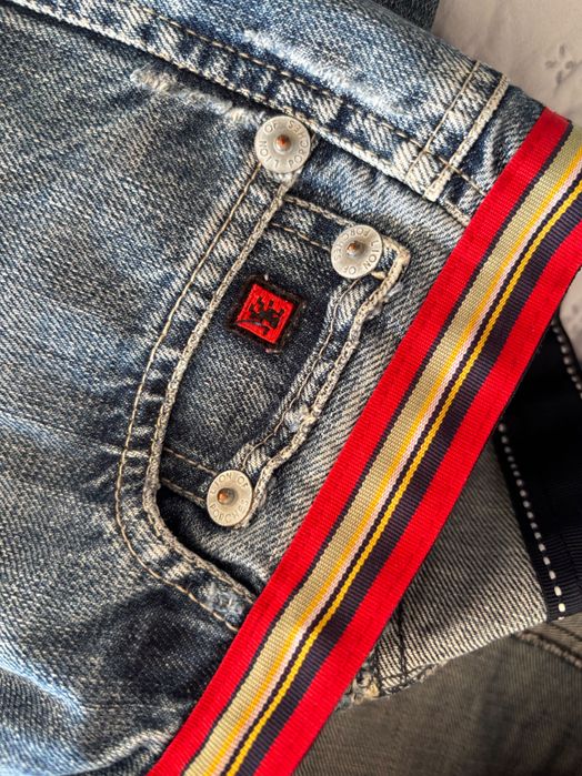 calças de ganga vintage lion of porches