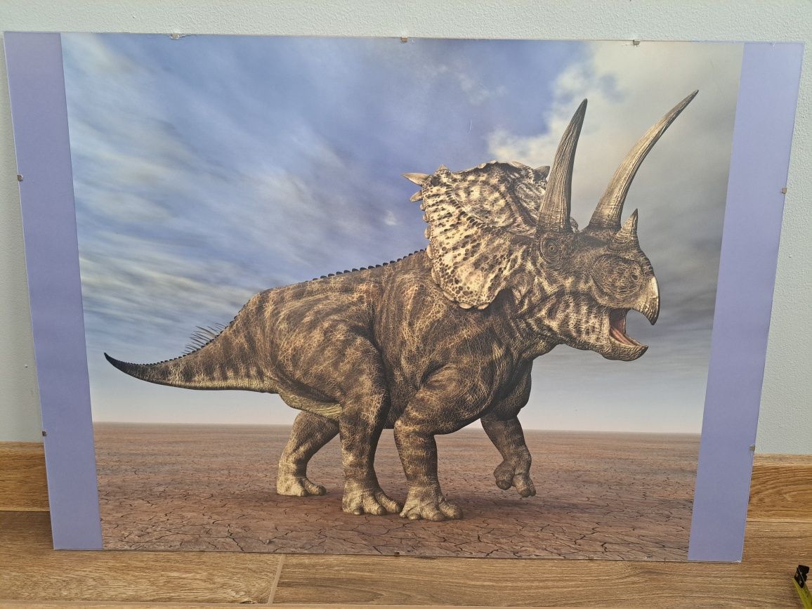 Plakat z dinozaurem w antyramie