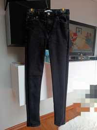 Jeansowe spodnie z wysokim stanem przetarcie Reserved jeansy grafitowe