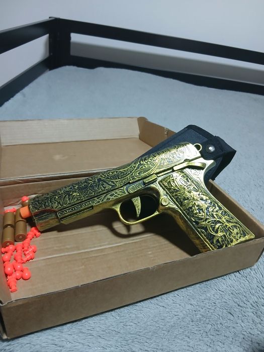 Pistola air-soft (mola) Semi-Automáticas M1911 dourada.