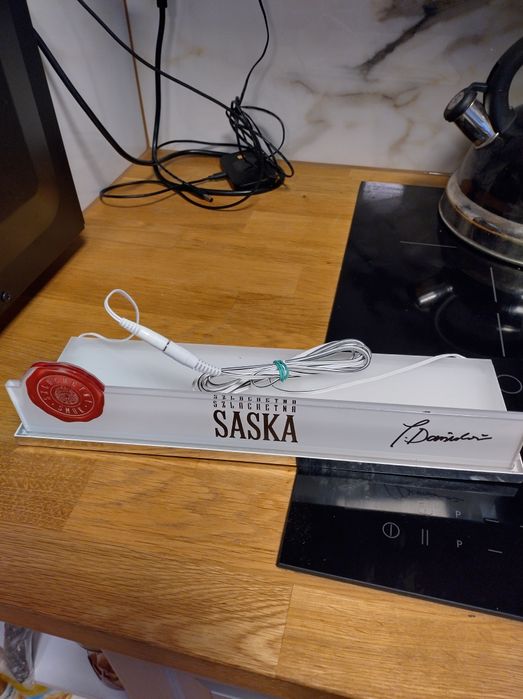 Reklama alkoholu Saska i Amundsen.
