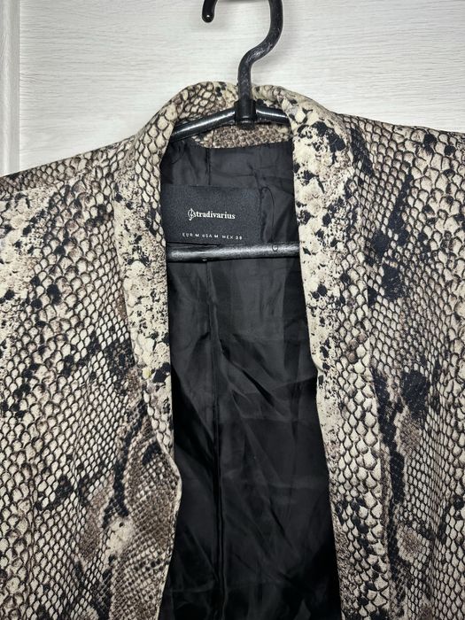 Пиджак зі скороченими рукавами