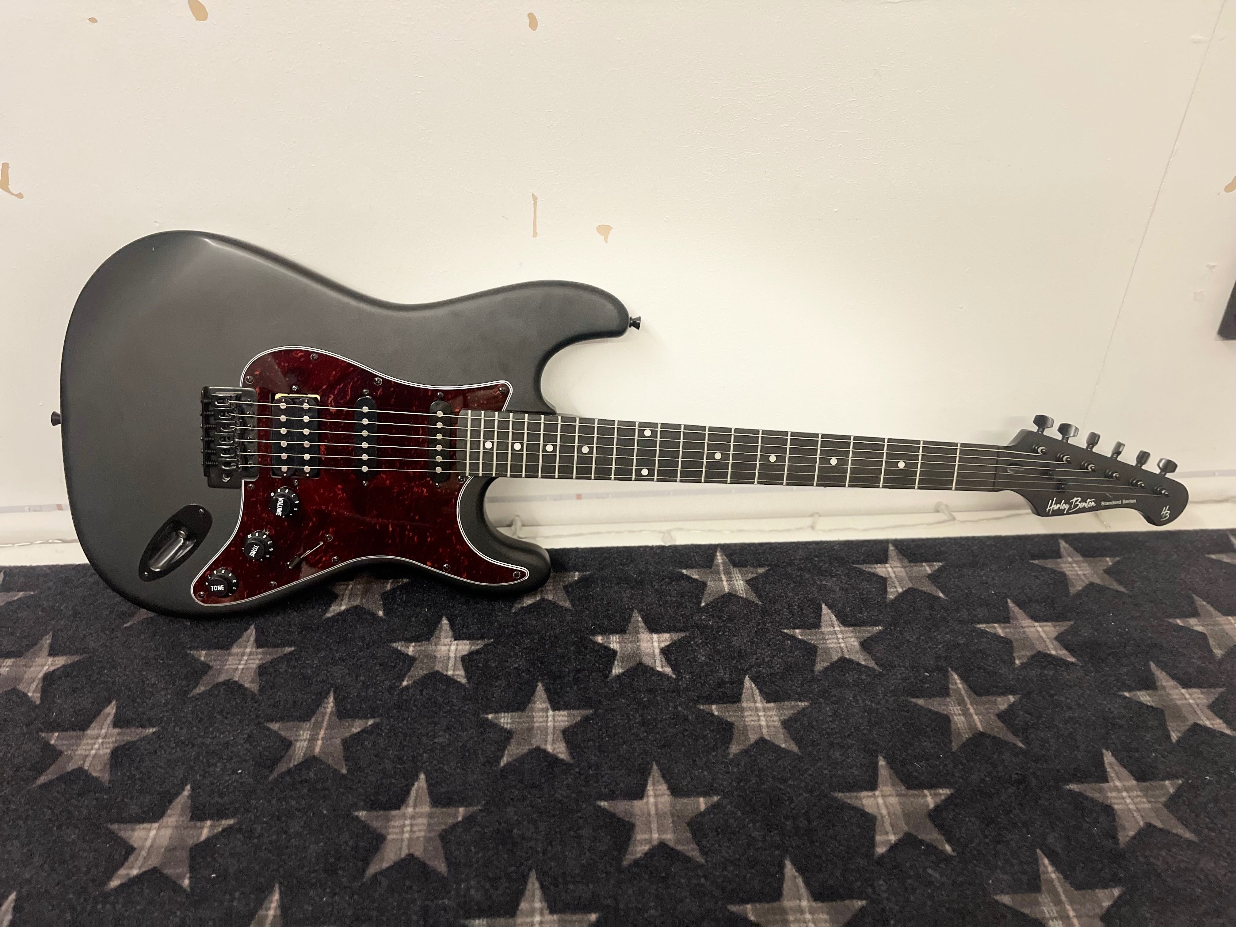 Fama amplificador & guitarra