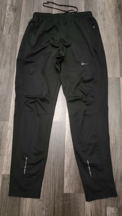 dresowe , sportowe, grubsze spodnie NIKE dri -fit z zamkami
