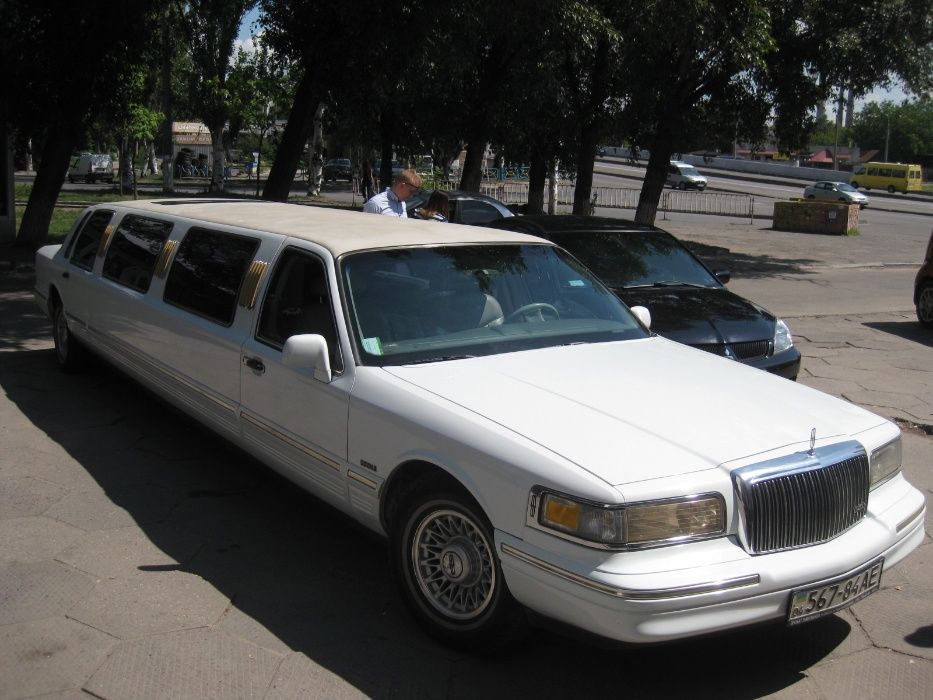 лимузин Линкольн белый 9,5м на 8-10 персон с люком аренда 2000 грн-ч
