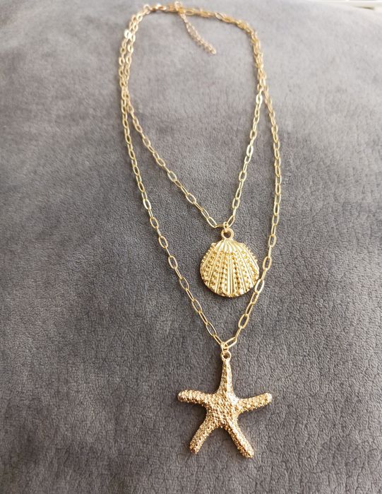 Colar de verão com estrela do mar e concha.

#colar #colaresfemininos