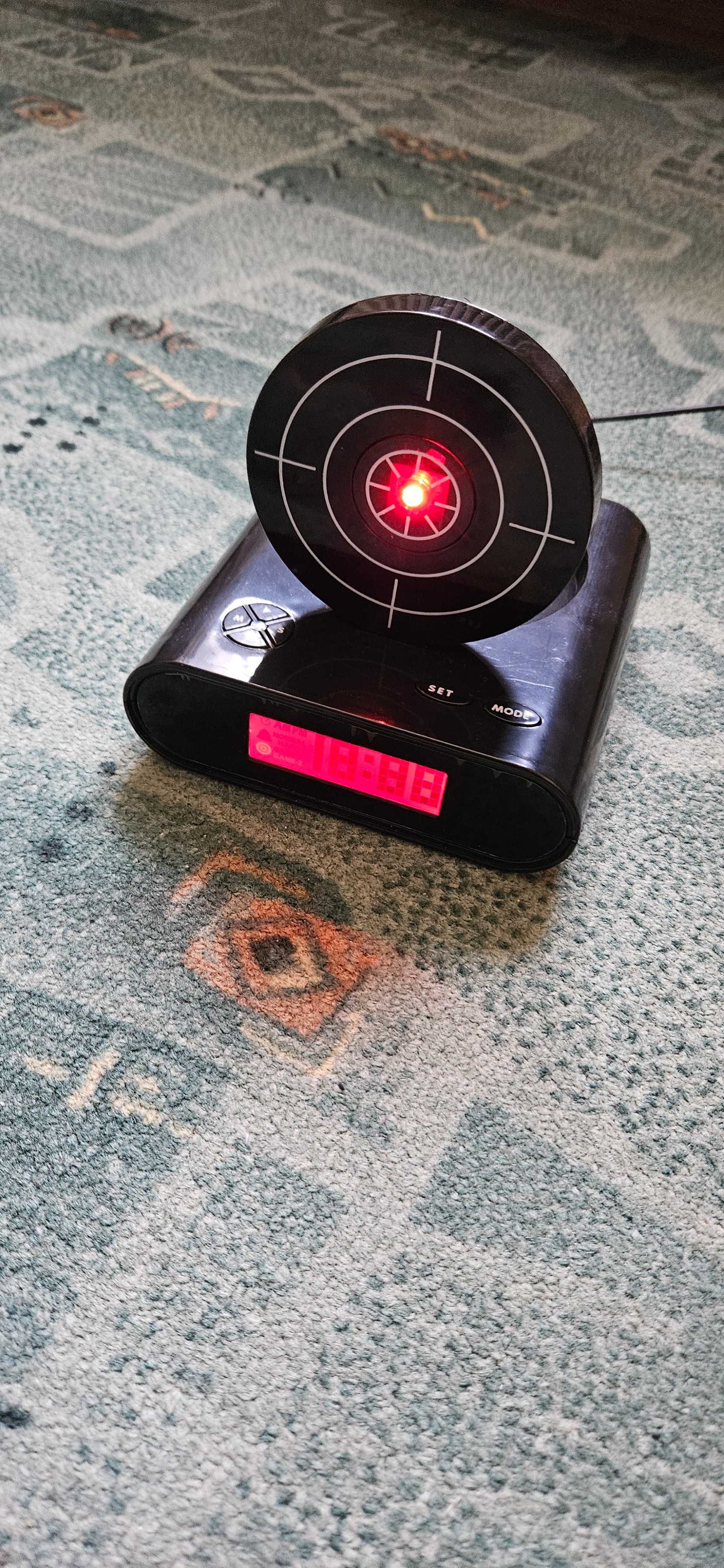 Budzik z tarczą, gun alarm clock + kabel zasilający, NOWY