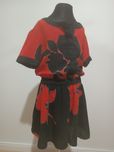 Elegancki kombinezon w kwiaty Next używany 122 cm/7 lat