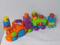 Развивающая игрушка "Веселый паровоз с кубиками блоками" Fisher price